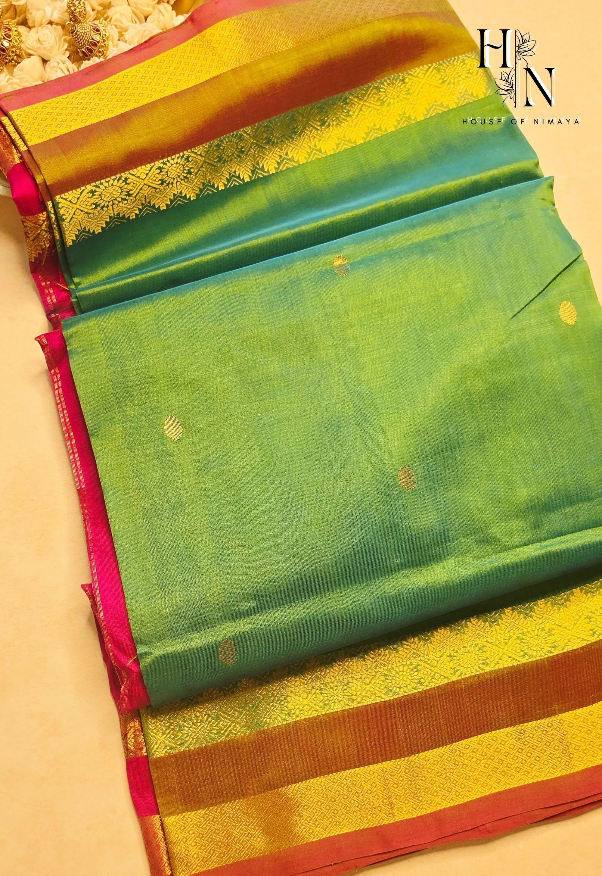Radiant Green and Pink Silk Cotton Saree